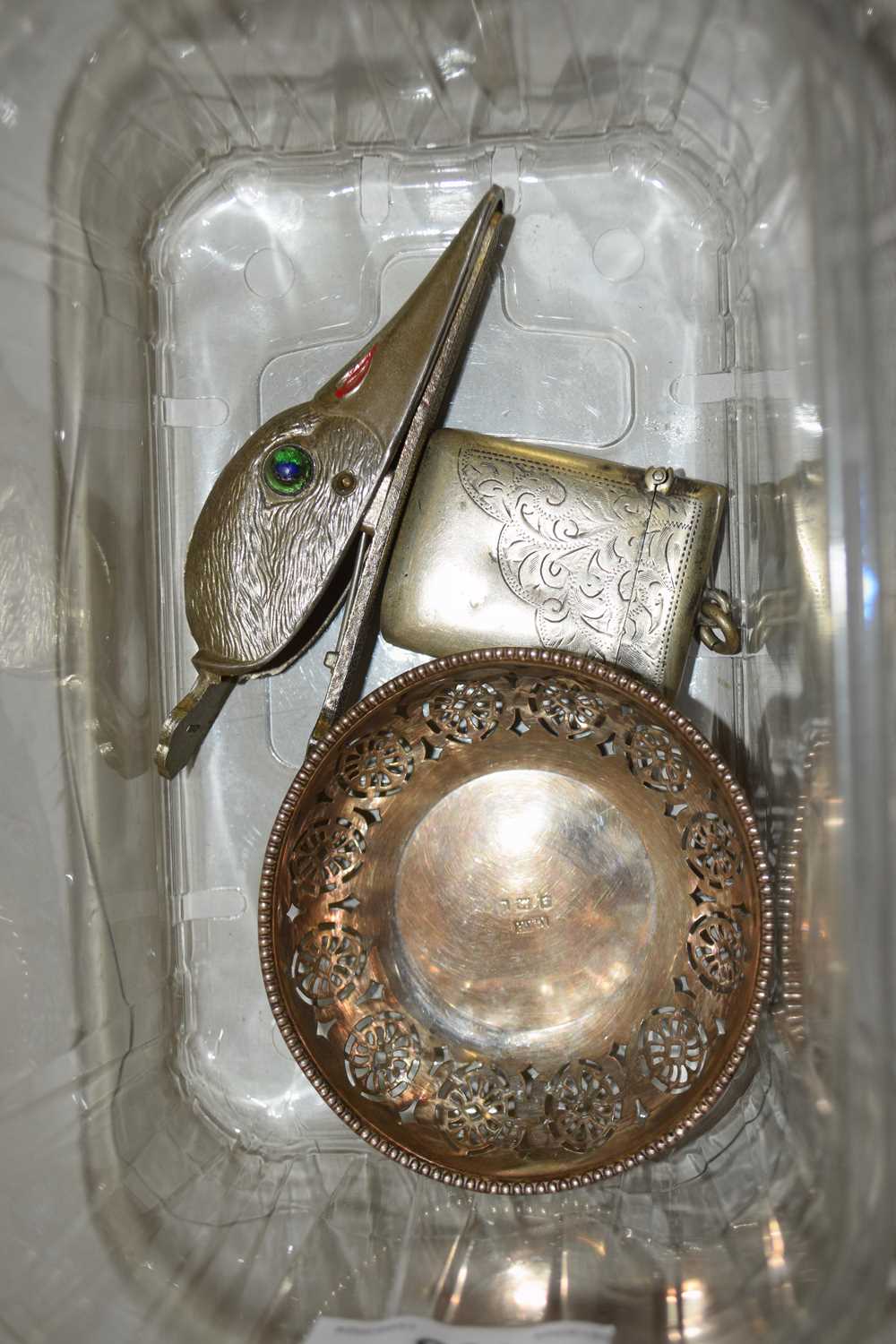 Box of mixed items to include a small silver pierced dish, a plated vester and a plated duck head