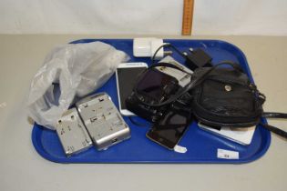 A tray of various mixed items to include battery chargers, Canon camera etc