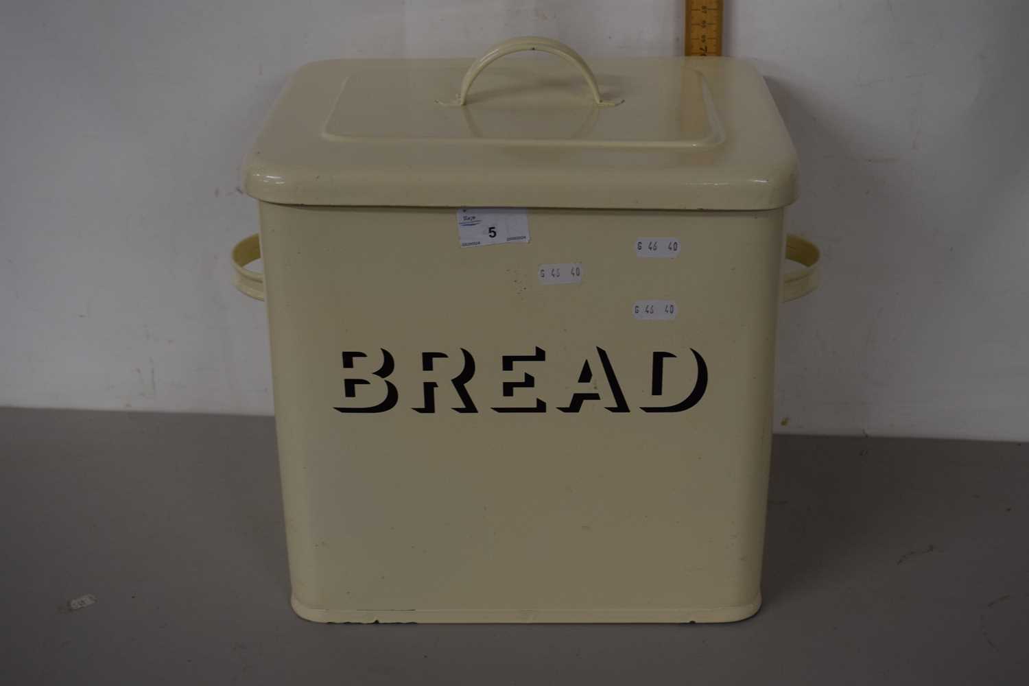 An enamel bread bin