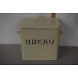 An enamel bread bin