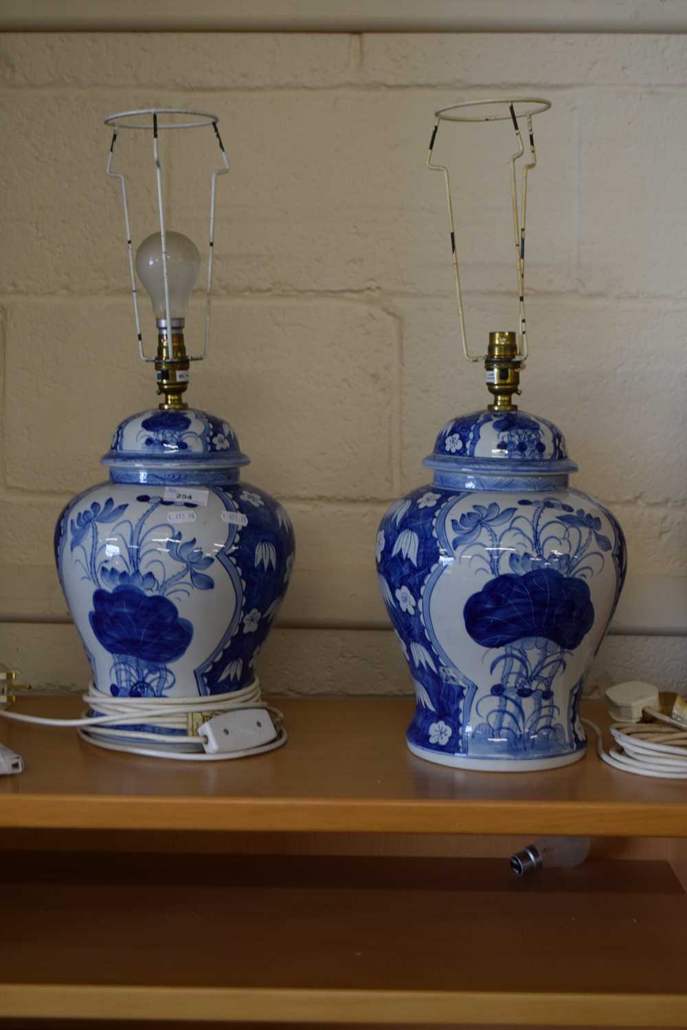 A pair of modern Oriental blue and white table lamps