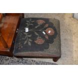 Small floral upholstered footstool