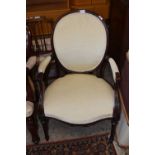 A Victorian armchair with oval upholstered back (a/f)