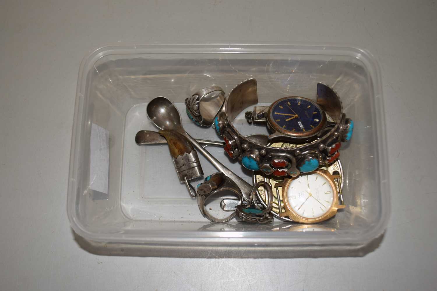 Box of various assorted items to include white metal bangle, various rings, an oversize United