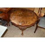 A 20th Century walnut veneered coffee table