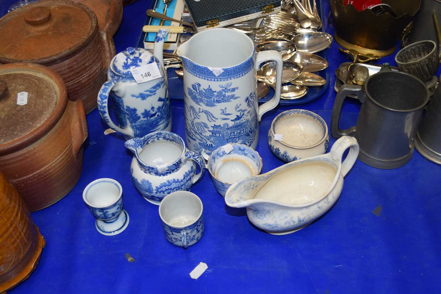 Mixed Lot: Various blue and white table wares to include large Willow pattern jug and others