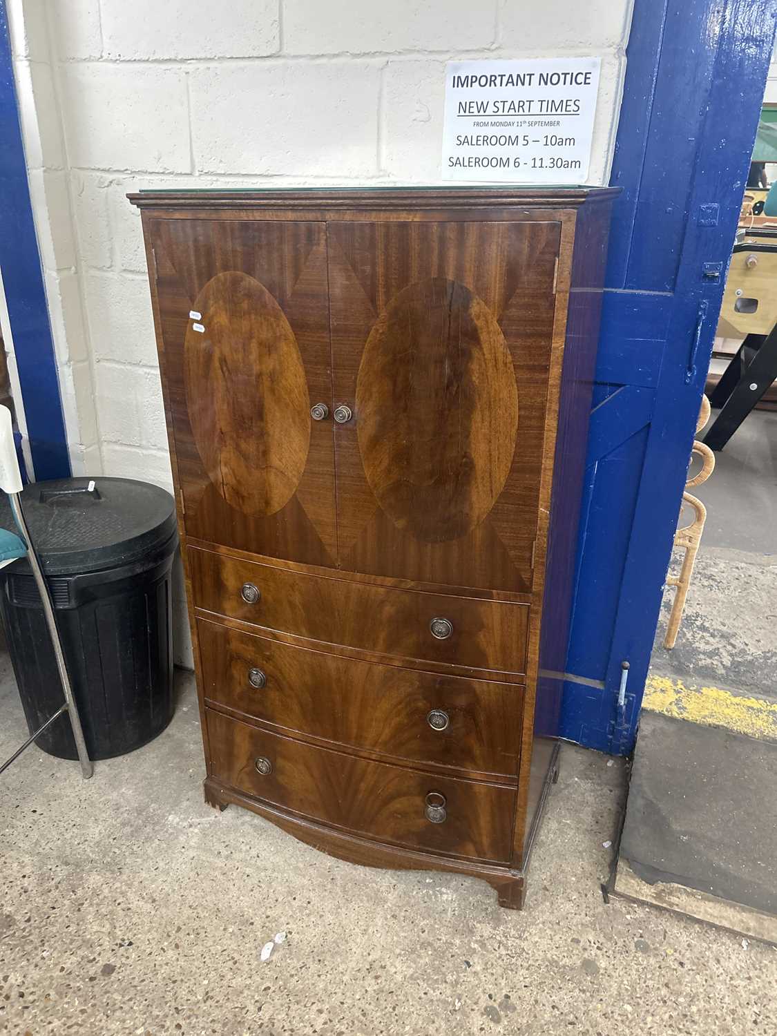 Early 20th Century mahogany veneered bow front tall boy cabinet with two doors and three drawers