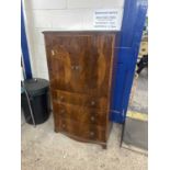 Early 20th Century mahogany veneered bow front tall boy cabinet with two doors and three drawers