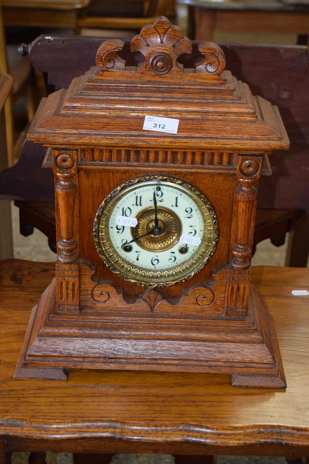 A late 19th Century oak cased American mantel clock by Sharon