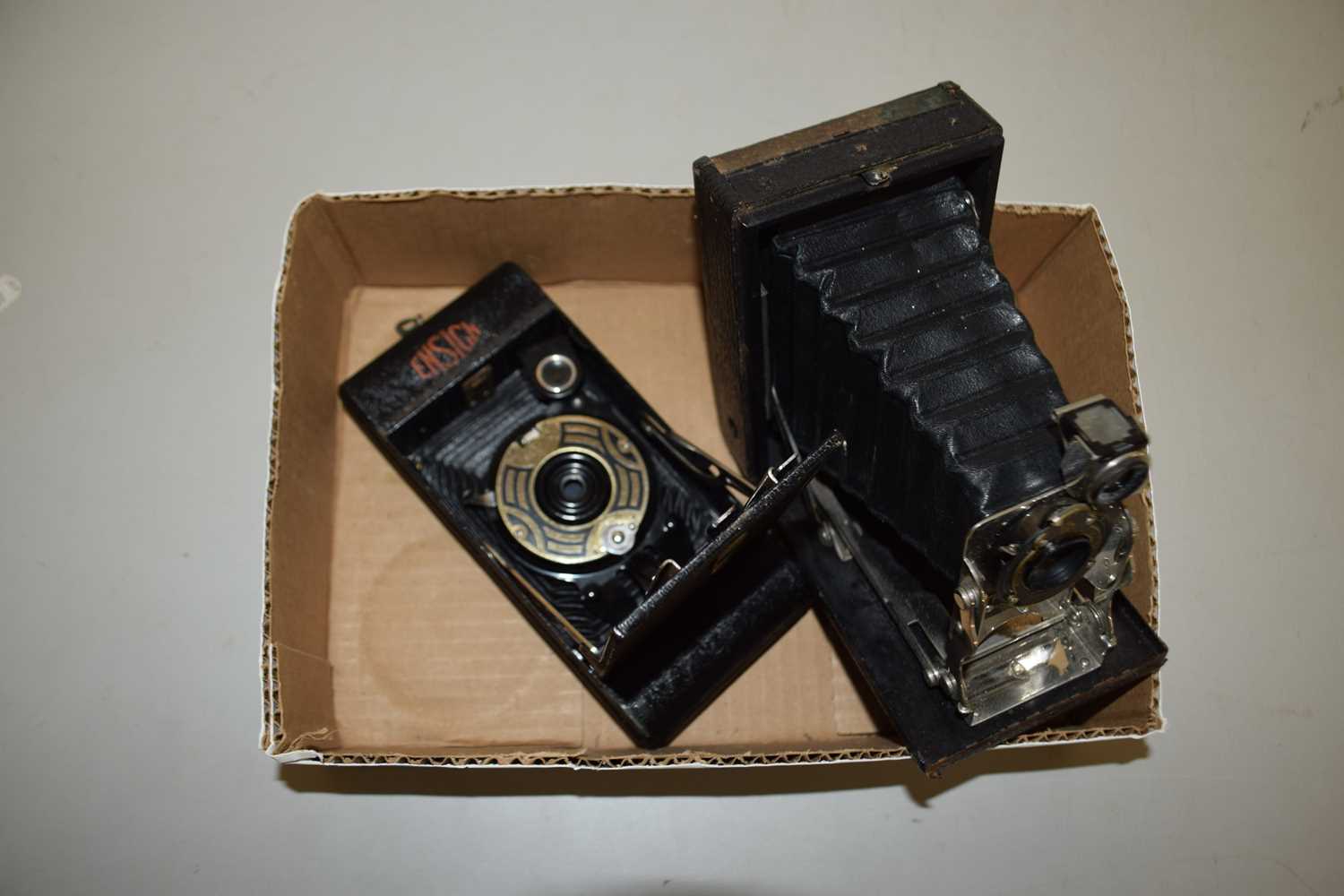 Two vintage cameras by Ensign & Kodak