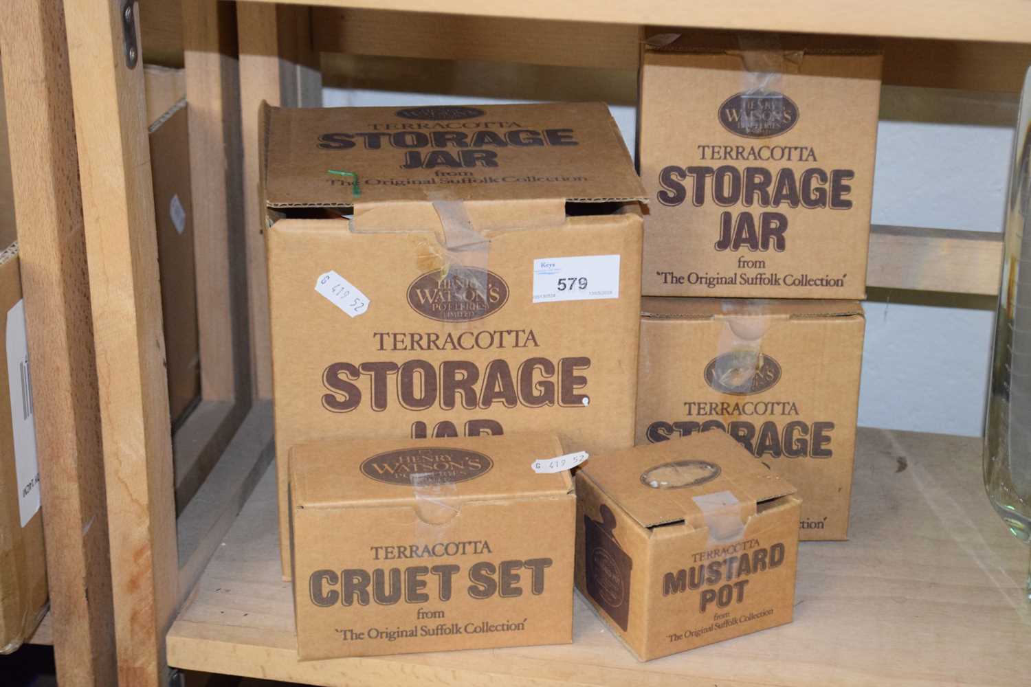 Terracotta storage jars and cruet set