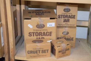 Terracotta storage jars and cruet set