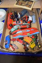 Assorted toy trucks, models etc together with a quantity of tin plate cars