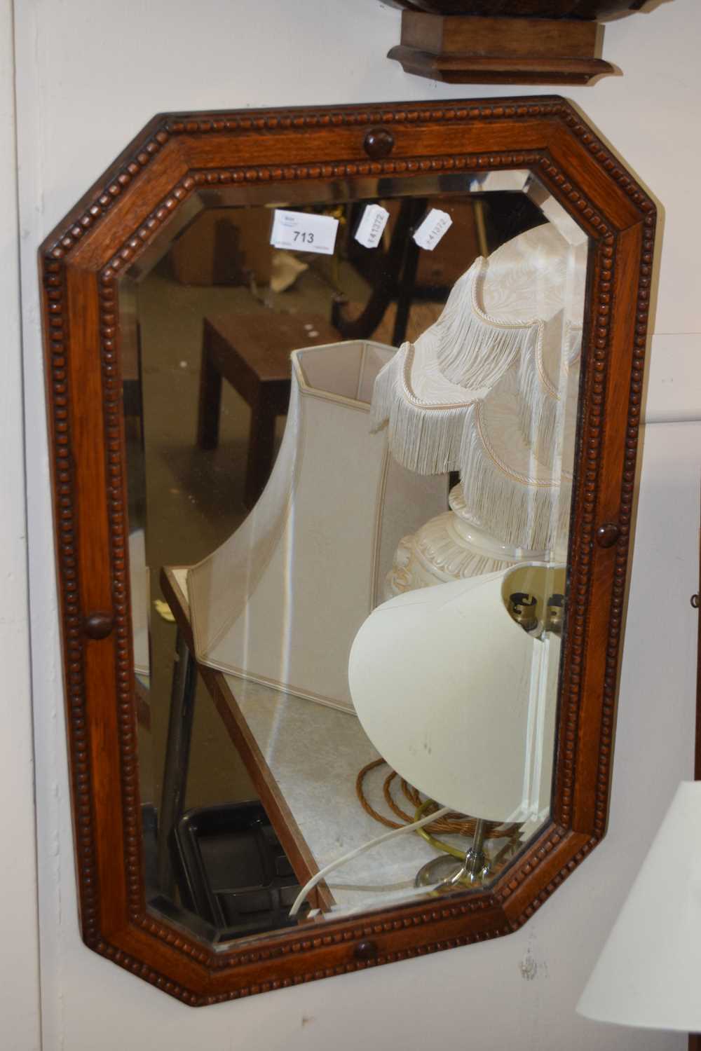 An octagonal wall mirror