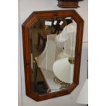 An octagonal wall mirror