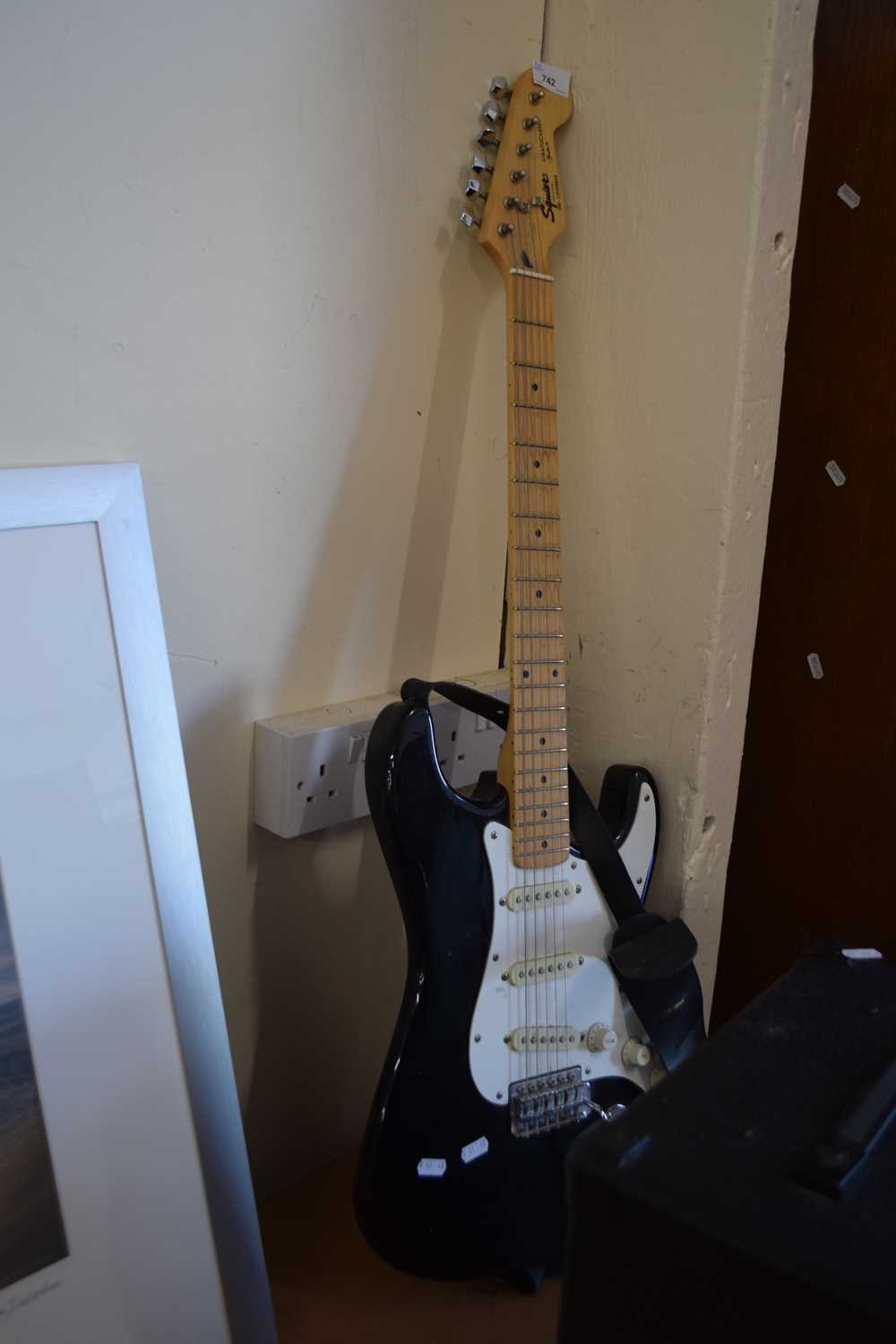 A Squier Stratocaster guitar