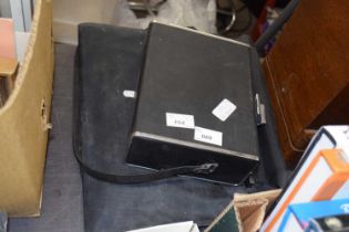 Vintage Cine camera and a laptop bag