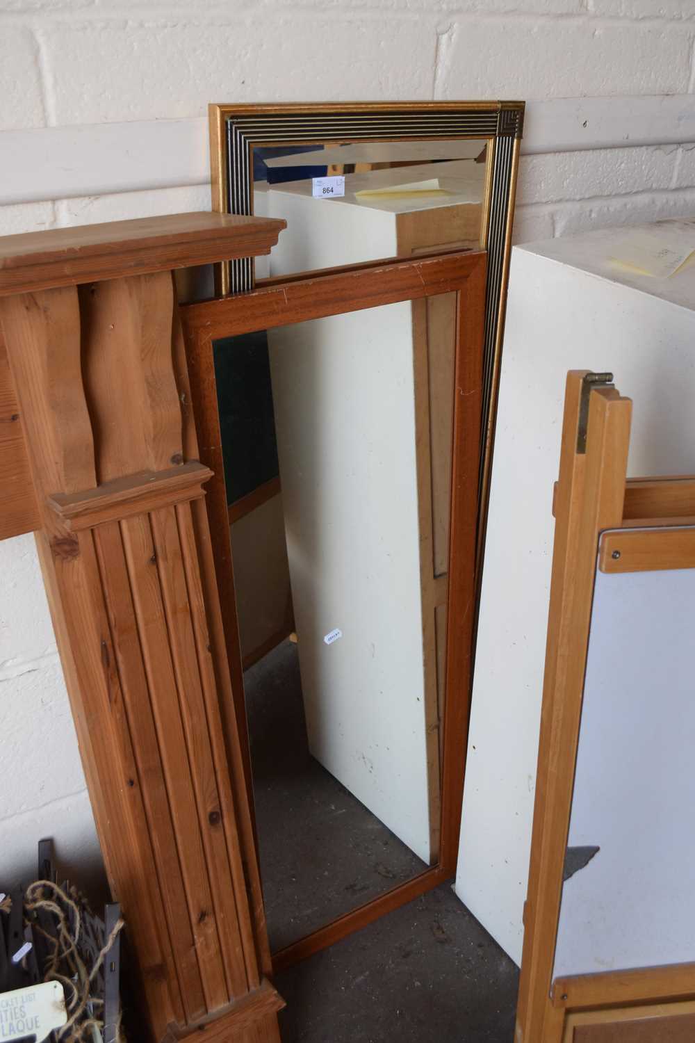 Two modern rectangular wall mirrors