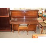A Regent piano with stool