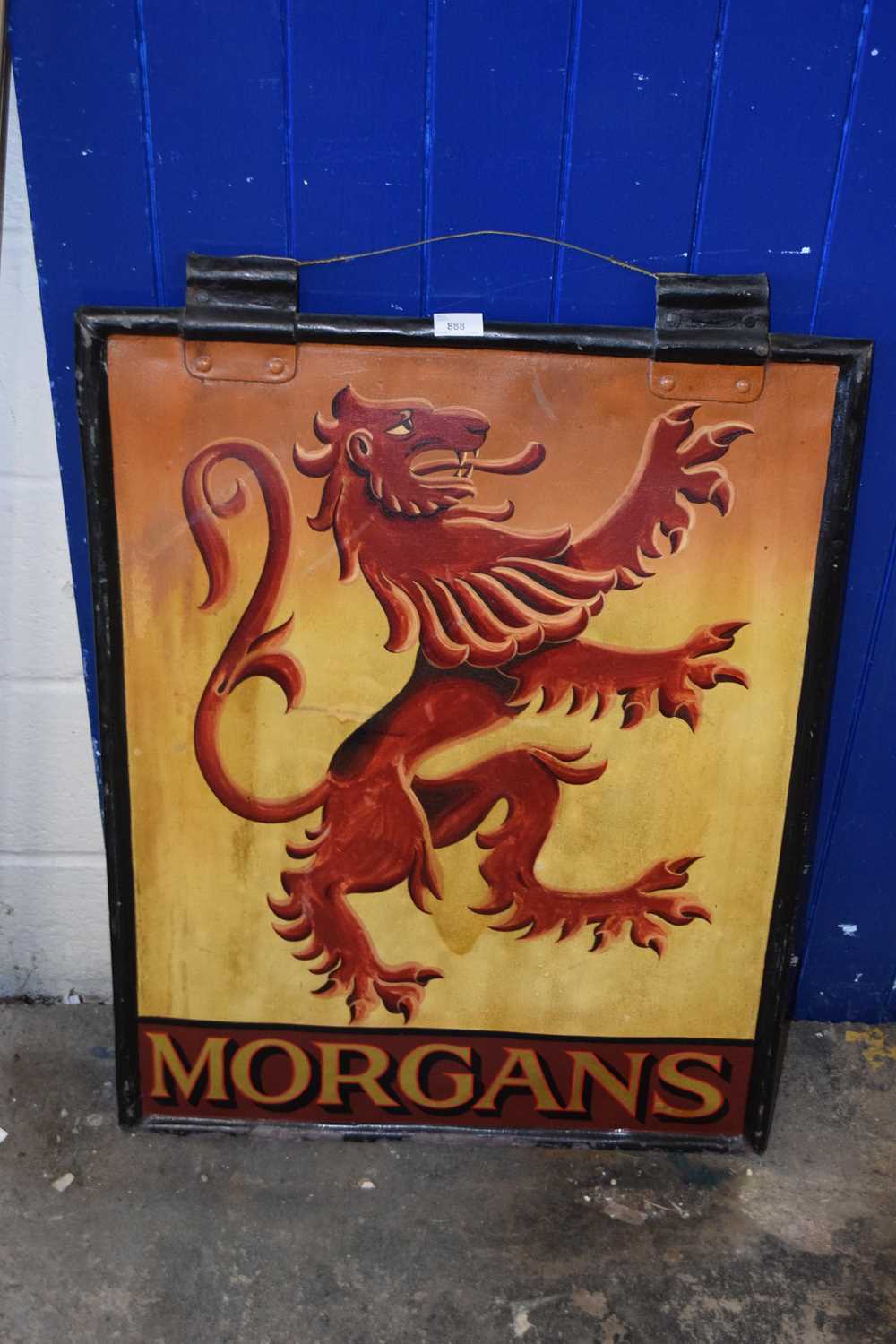 Metal framed pub signed marked Morgans Ely Aly with Red Lion emblem