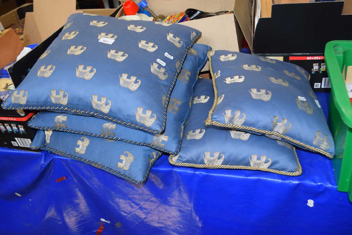 Six blue and gilt thread elephant pattern cushions