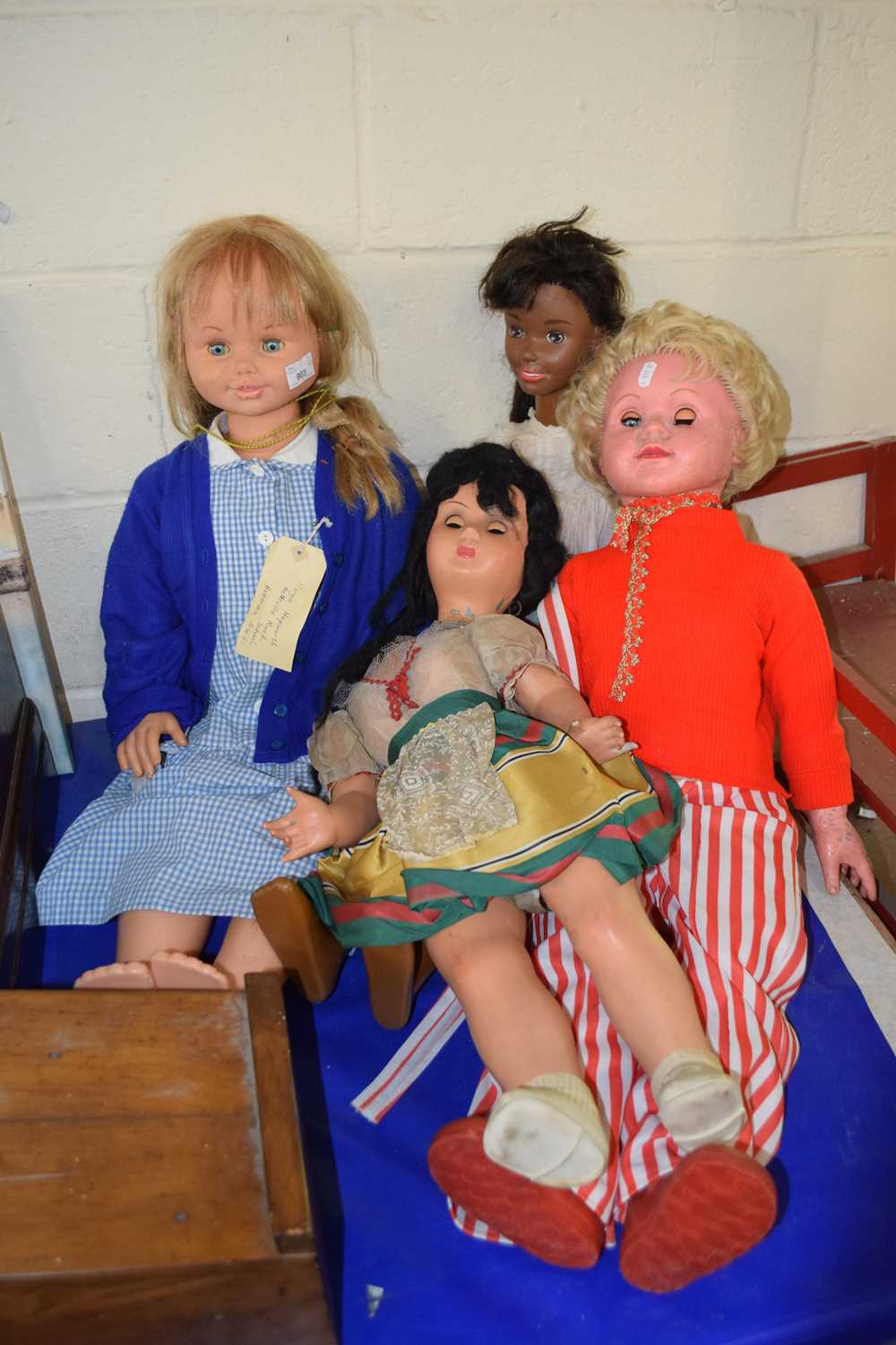 Group of four vintage dolls