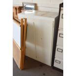 A white painted two door cupboard and contents