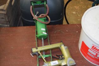 A foot pump together with an air compressor stapler gun