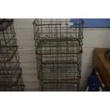 Four galvanised milk crates