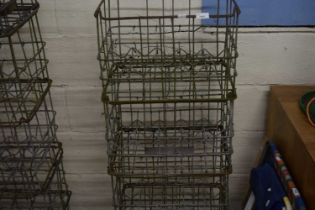 Four galvanised milk crates