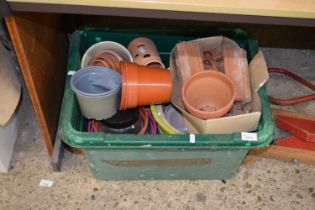 A box of mixed plant pots, terracotta pots etc
