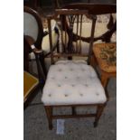 An Edwardian side chair with button upholstered seat