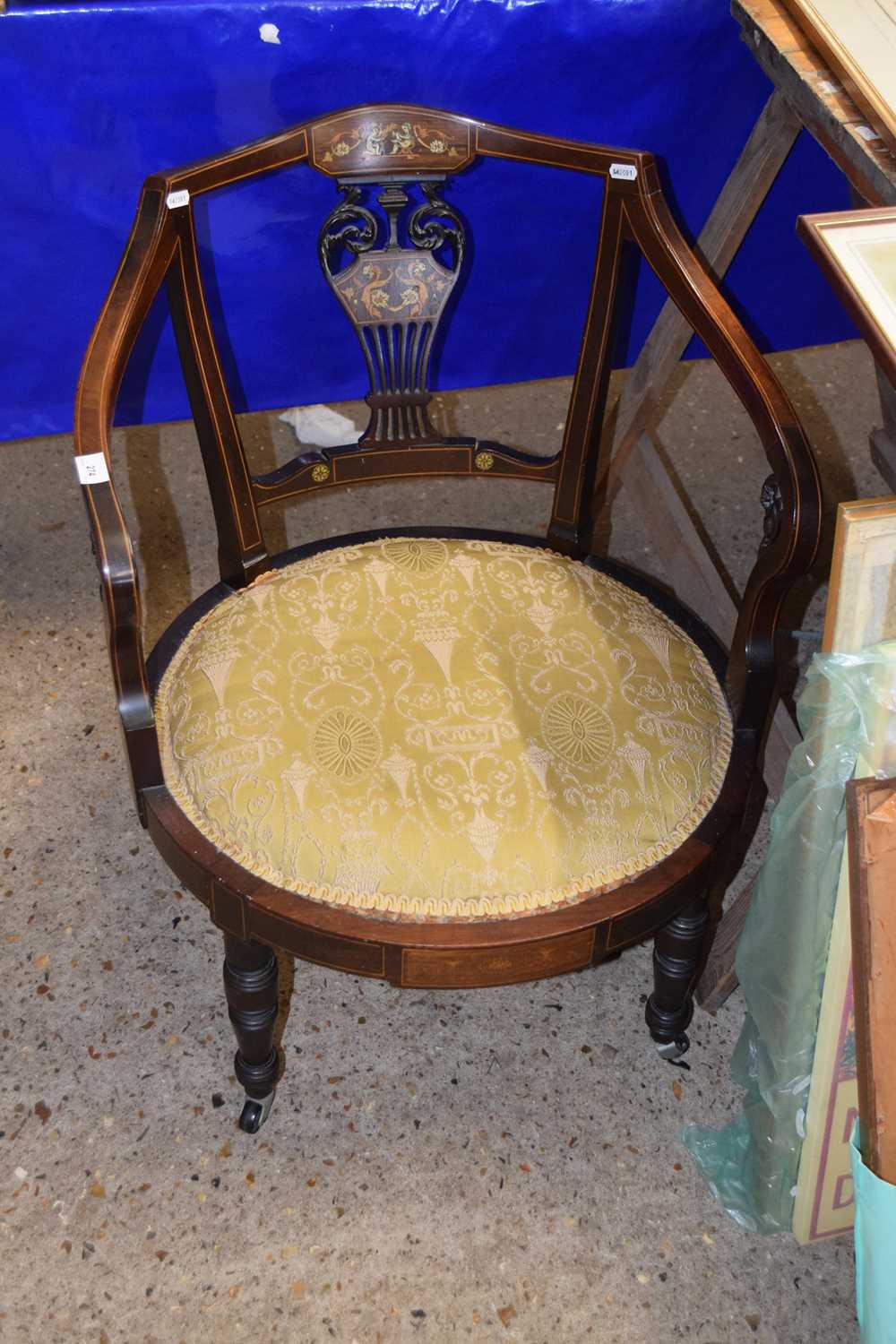 An Edwardian sheraton revival inlaid bow back armchair