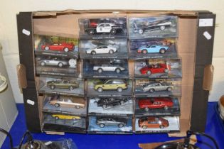 A group of cased James Bond vehicles