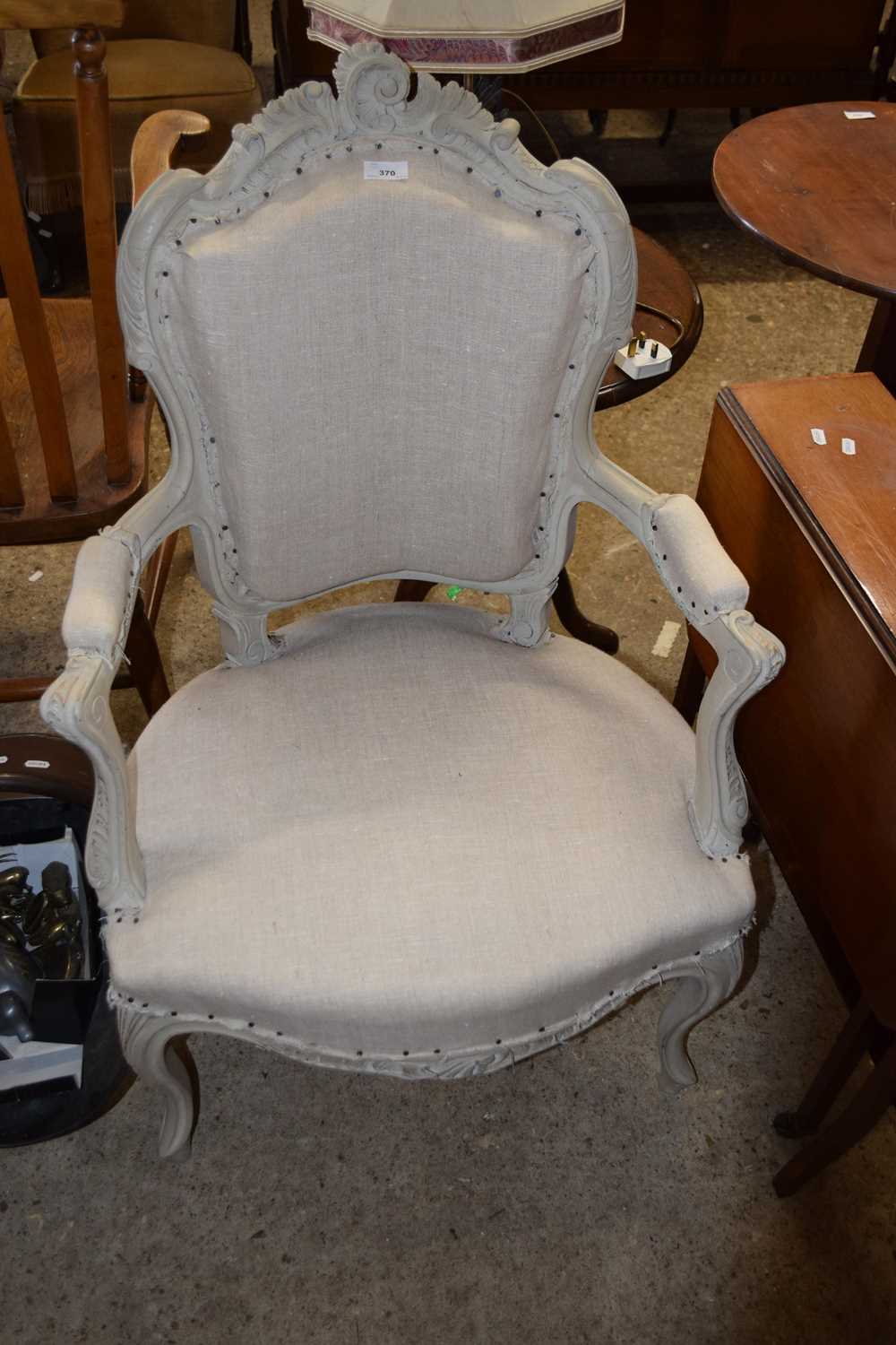 A continental armchair with painted frame for re-upholstery