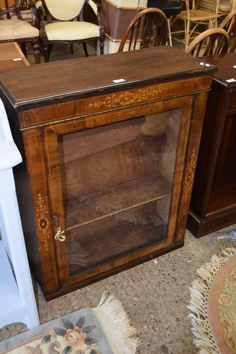 A Victorian walnut veneered pier type cabinet