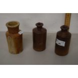 A group of three small stone ware bottles