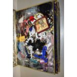 A large tin of various assorted costume jewellery