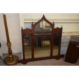 19th Century arched over mantel mirror in mahogany frame