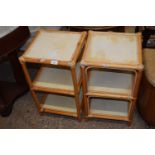 A pair of bamboo framed shelf units