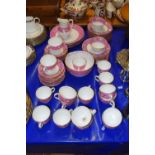 Quantity of Victorian gilt and pink decorated table wares