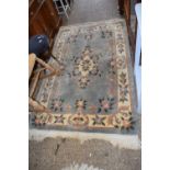 A Chinese floral patterned carpet