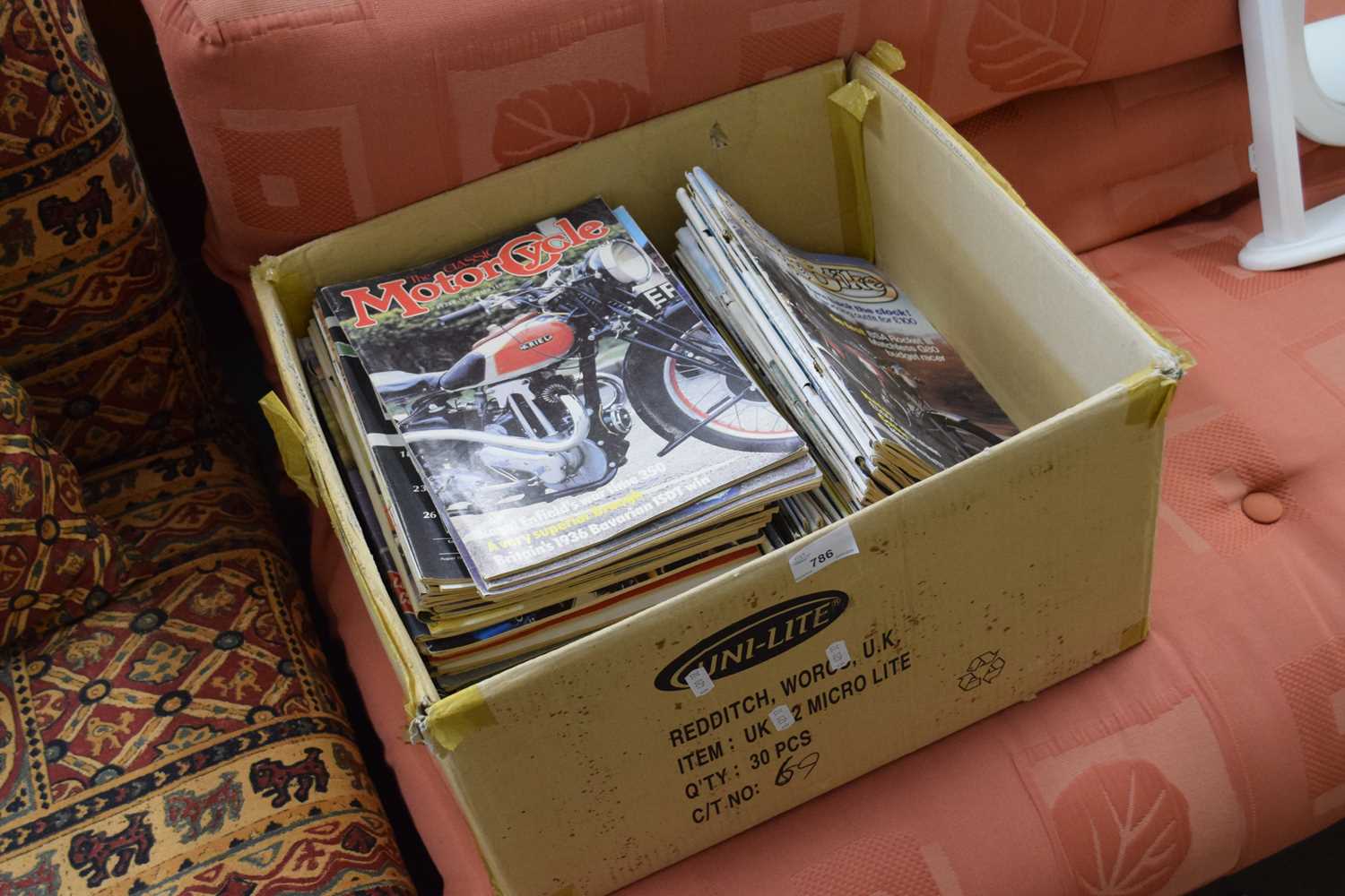 Box of motorcycle magazines
