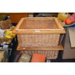 Two wicker baskets with wooden frames