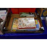 Box containing stamp album and children's games