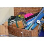 Large wicker box containing a quantity of tennis rackets andother items