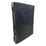 An Album of Photographs. C1850s-1938 with Ephemera. Bound in pebbled dark cloth, fraying to spine.