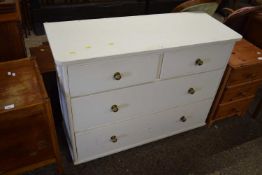 A white finish four drawer bedroom chest