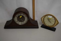 A dome topped mantel clock in dark wood case plus one other (2)