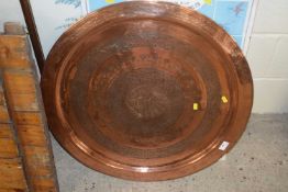 Large Middle Eastern copper serving tray with decorative banding